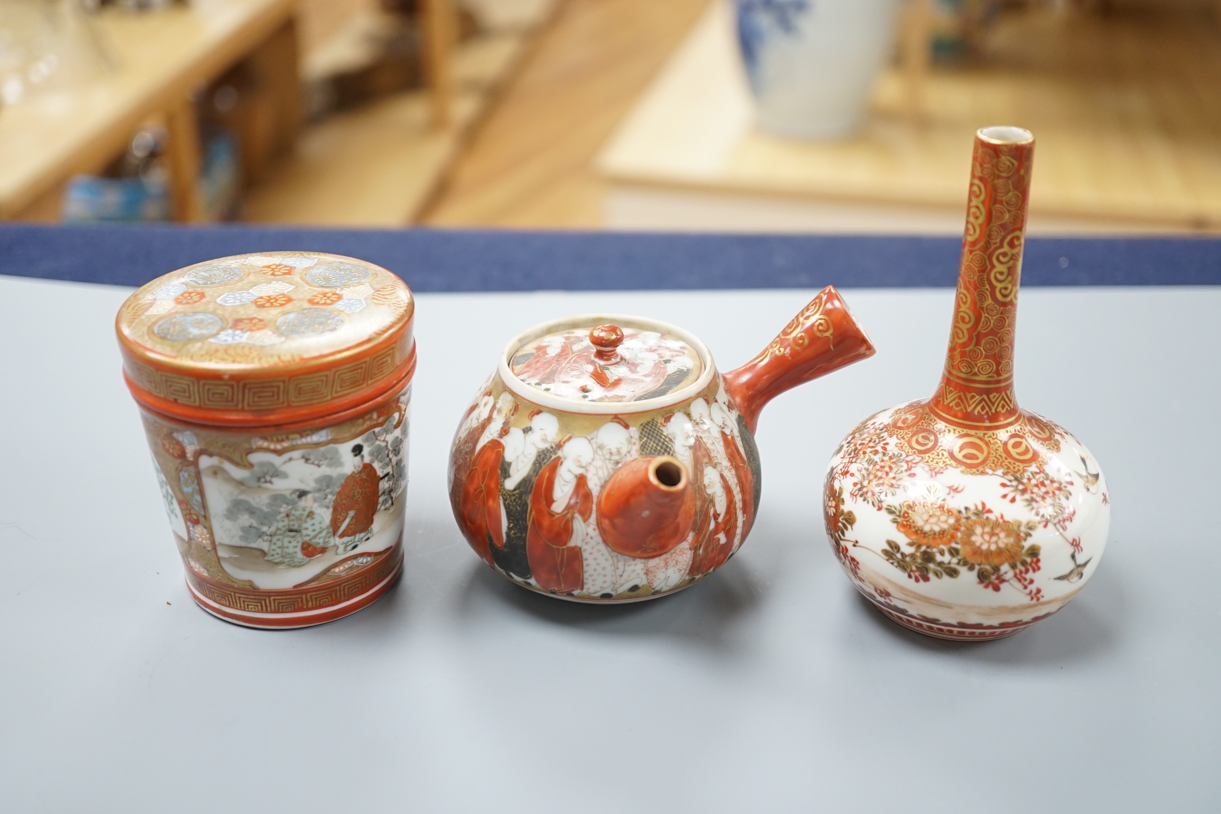 A group of Japanese small or miniature Kutani and Imari vessels and three Satsuma pottery mounted brooches, largest 11.7cm